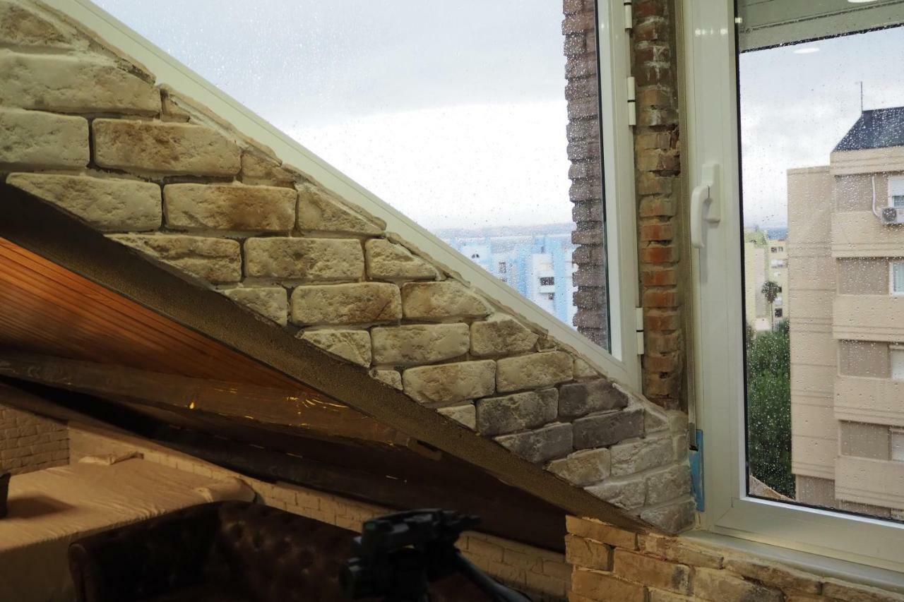 Tiny On The Roof Touching Gibraltar